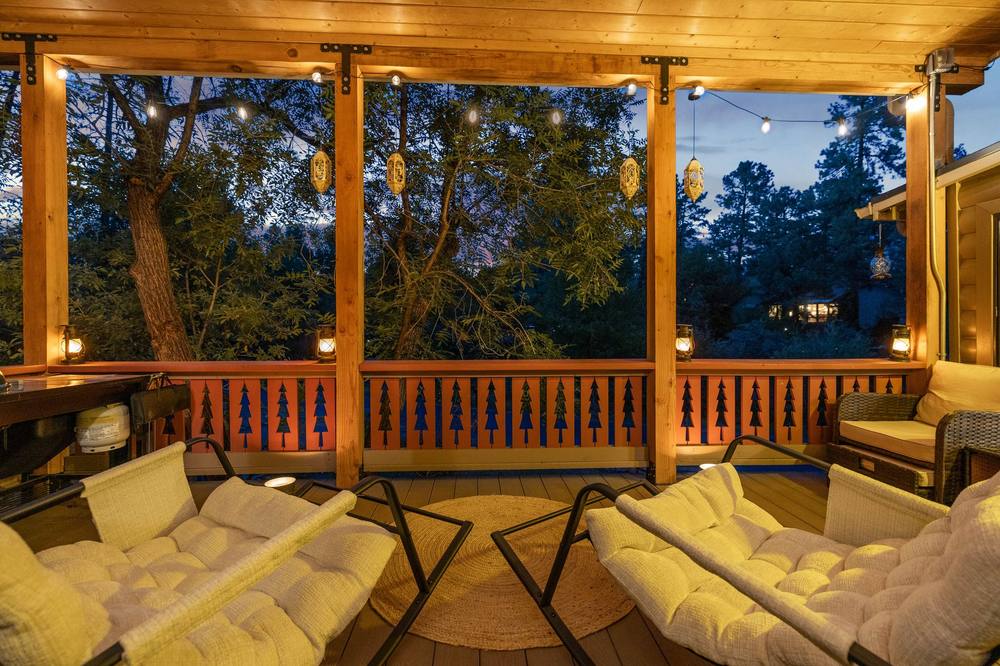 The Treehouse glowing at dusk